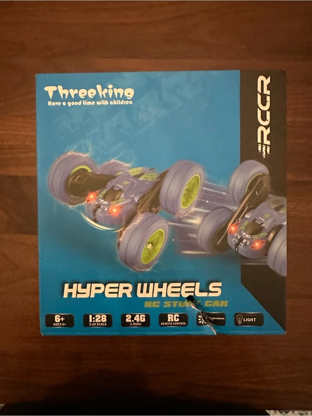 Never opened, NWT  Hyper Wheels RC Stunt Car - Blue with Green Wheels